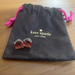 Kate Spade Stud Earrings in gold with a pinky/orange colored stone